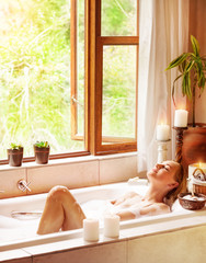 Happy woman bathing