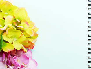 note book diary and beautiful flower bouquet background
