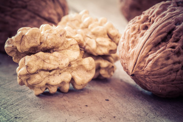 Walnuts on a wooden table.