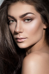 Obraz premium Beautiful portrait of a woman with fashion makeup