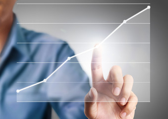 businessman Touching graph
