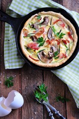 quiches with bacon, zucchini and mushrooms