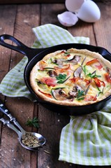 quiches with bacon, zucchini and mushrooms