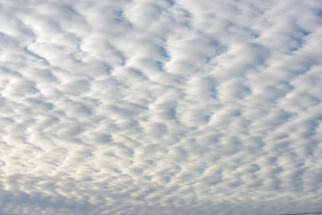 Wide angle view of cloudscape as natural background.