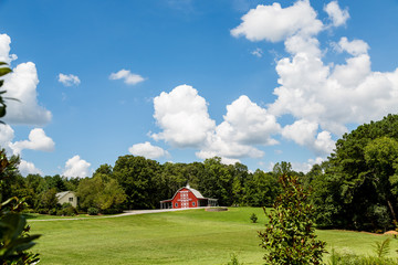Red Barn on Grassy Hill