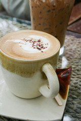 hot cappuccino coffee drink with latte art