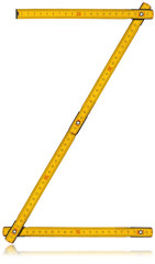 Font Z - Old Yellow Meter Ruler / Old wooden yellow meter in the shape of letter Z. Isolated on...