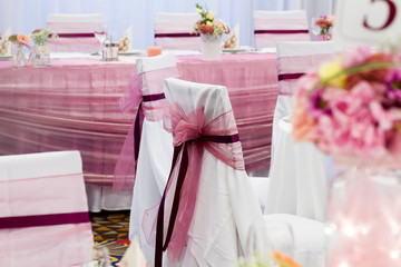 Fototapeta na wymiar wedding chairs with ribbon