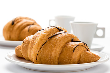 fresh croissant and coffee