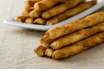 many pastry sticks with cheese