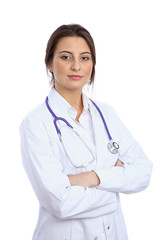 Friendly smiling young female doctor, isolated over white background