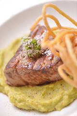 Beef steak on wooden table