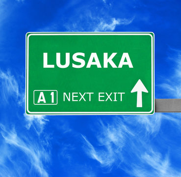 LUSAKA road sign against clear blue sky