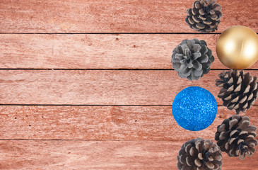 pine ball and plastic ball stick on the right of the frame