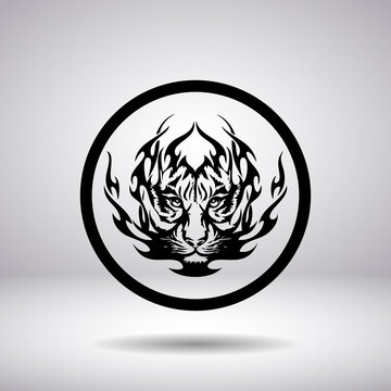 Silhouette of tiger head in a circle