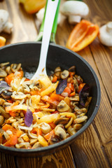 fried mushrooms with peppers and onions