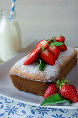 omemade cake with strawberries on the table