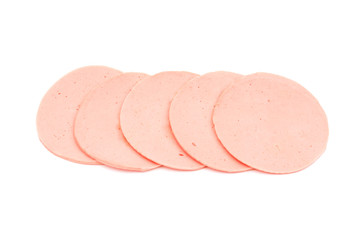 ham sausage or rolled bologna slices isolated on white backgroun