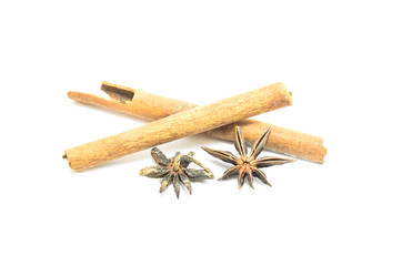 Cinnamon and chinese star anise on white background