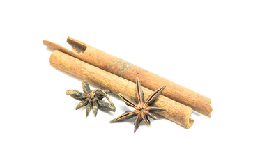 Cinnamon and chinese star anise on white background