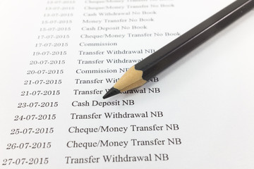 Bank statement paper with pencil : Can used for financial background.
