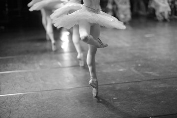 Fototapeta premium Elegant and effortless-looking pirouettes, low section of ballerinas