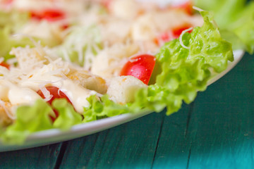 Caesar Salad on a serving plate on a table