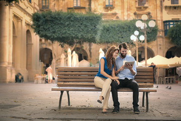 Couple sitting on a bench