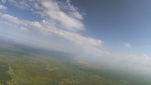  Flight like airplane view under clouds at  height of 1500 meters  with turn. Aerial  