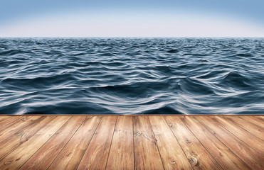 Blue ocean and clear sky with wooden platform