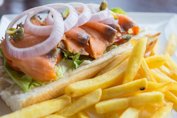 Sandwich tuna with french fries, selective focus point