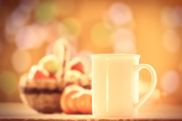 Pumpkin, basket with apples and cup