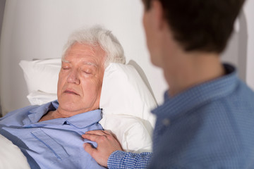 Elder sick man sleeping