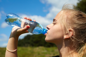 Young girl drink water