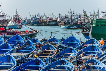 blue boats in the harbour of essaouira