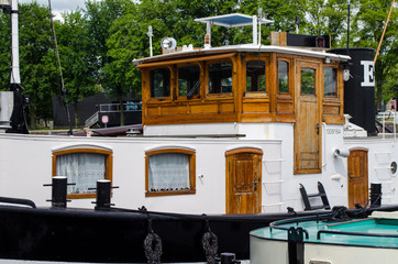 Old vintage boat on the Amsterdam canal