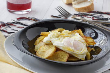 fried eggs with potatoes