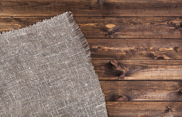 linen cloth on dark wooden background