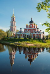 Fototapeta premium Cathedral in memory of the Resurrection of Jesus Christ is on the banks of the River Polist in small provincial Russian town of Staraya Russa