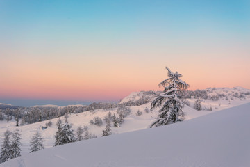 Fototapeta na wymiar Magical sunset winter in Julian Alps mountains