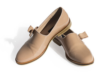 beige shoes from a patent leather