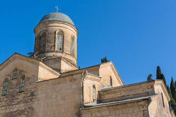 Fototapeta na wymiar Byzantine style old temple exterior, New Athos, Abkhazia