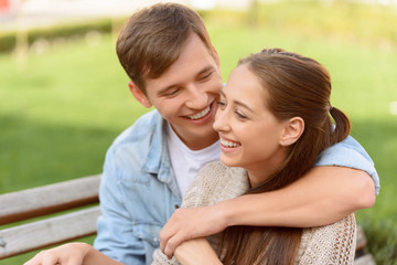 Pleasant couple embracing 