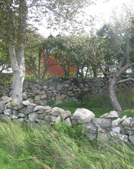 Traditional drystone wall as house boundary in Falkenberg, Sweden.