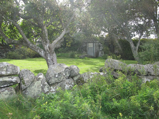 Traditional drystone wall as house boundary in Falkenberg, Sweden.