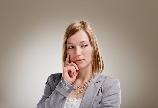 Portrait of quizzical looking blond woman