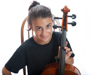 Close view of smiling girl playing her cello