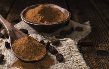 Cola Nut Powder on wooden background