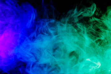 Abstract blue and green smoke hookah on a black background.