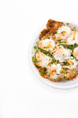 an indian dish Tandoori Omlette in which bread is rolled between an omlette and slightly baked then topped with mayonnaise and cheese isolated on white background available with clipping mask